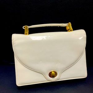 Vintage white leather handbag by Neusteters.